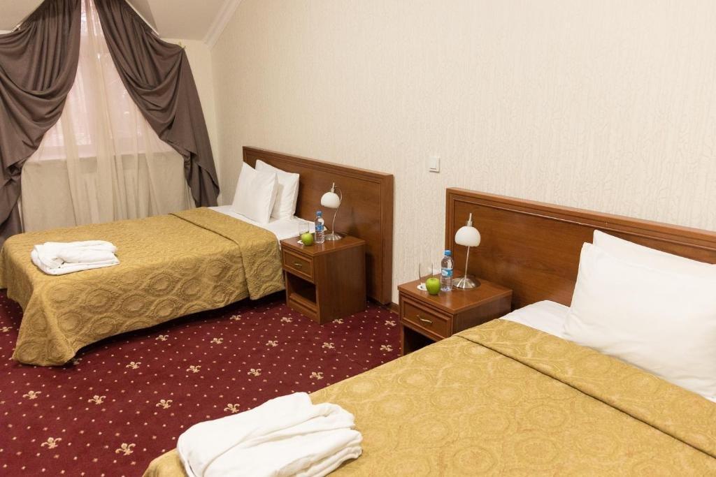 Amsterdam Hotel Aktobé Extérieur photo